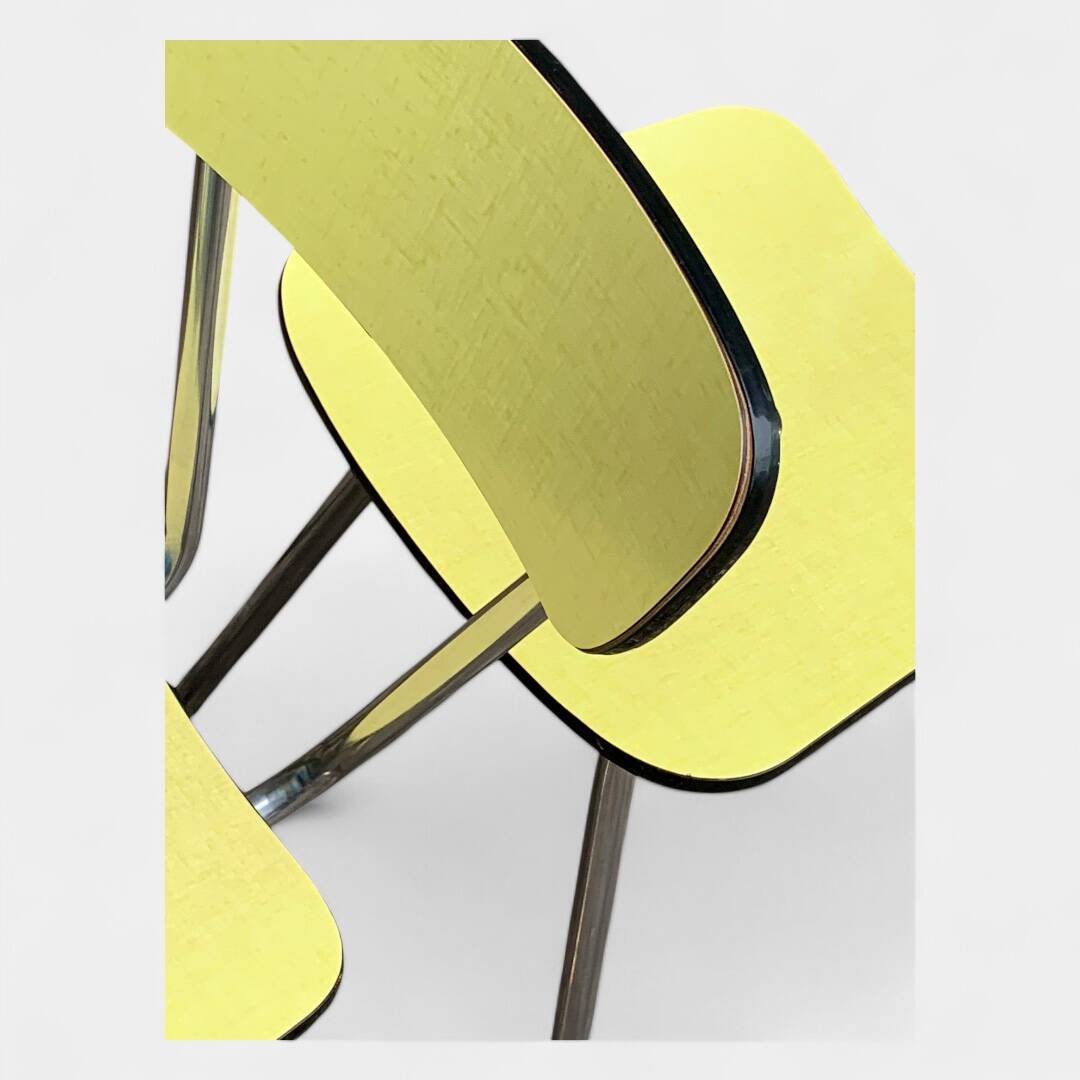 Yellow Formica chairs with compass legs, 1950s