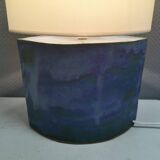 Sculptural table lamp in blue glaze with an abstract expression.