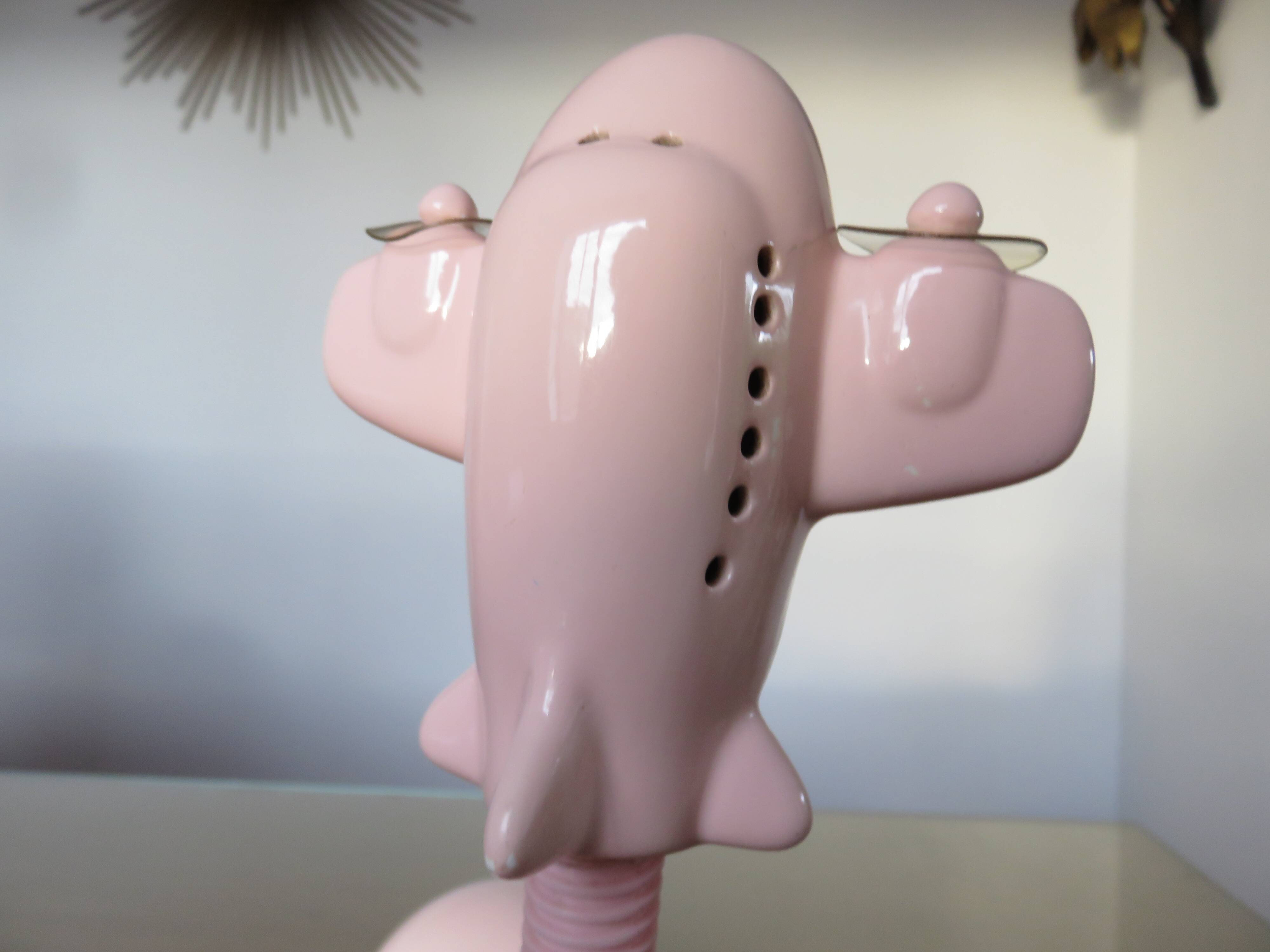 Pink ceramic “airplane” lamp from the 80s