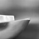 Sculptural polished aluminium bowl, in the style of Michael Lax, 1970s.