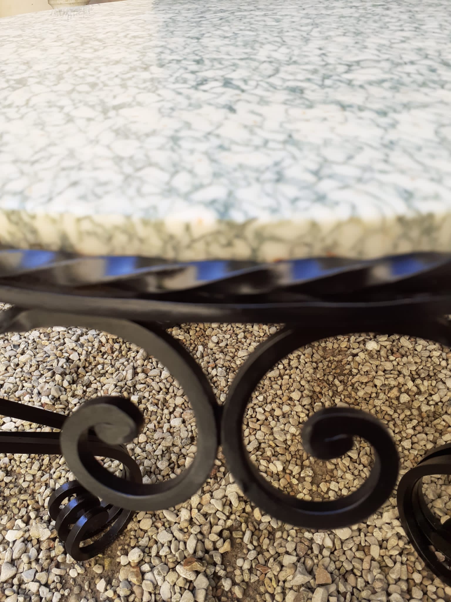 Marble and wrought iron coffee table