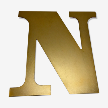 Old store golden brass letter