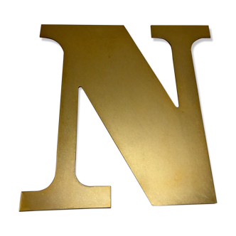 Old store golden brass letter