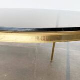 Mid-century Hollywood Regency style coffee table in brass and glass, made in Germany by Vereinigte Werkstätten, 1960s.