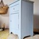 Handcrafted blue chest of drawers.