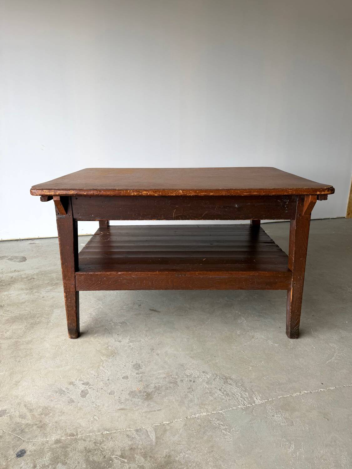 Antique draper's workbench / haberdashery table in solid wood from the early 20th century.