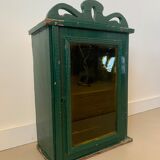 Wall vitrin with pediment