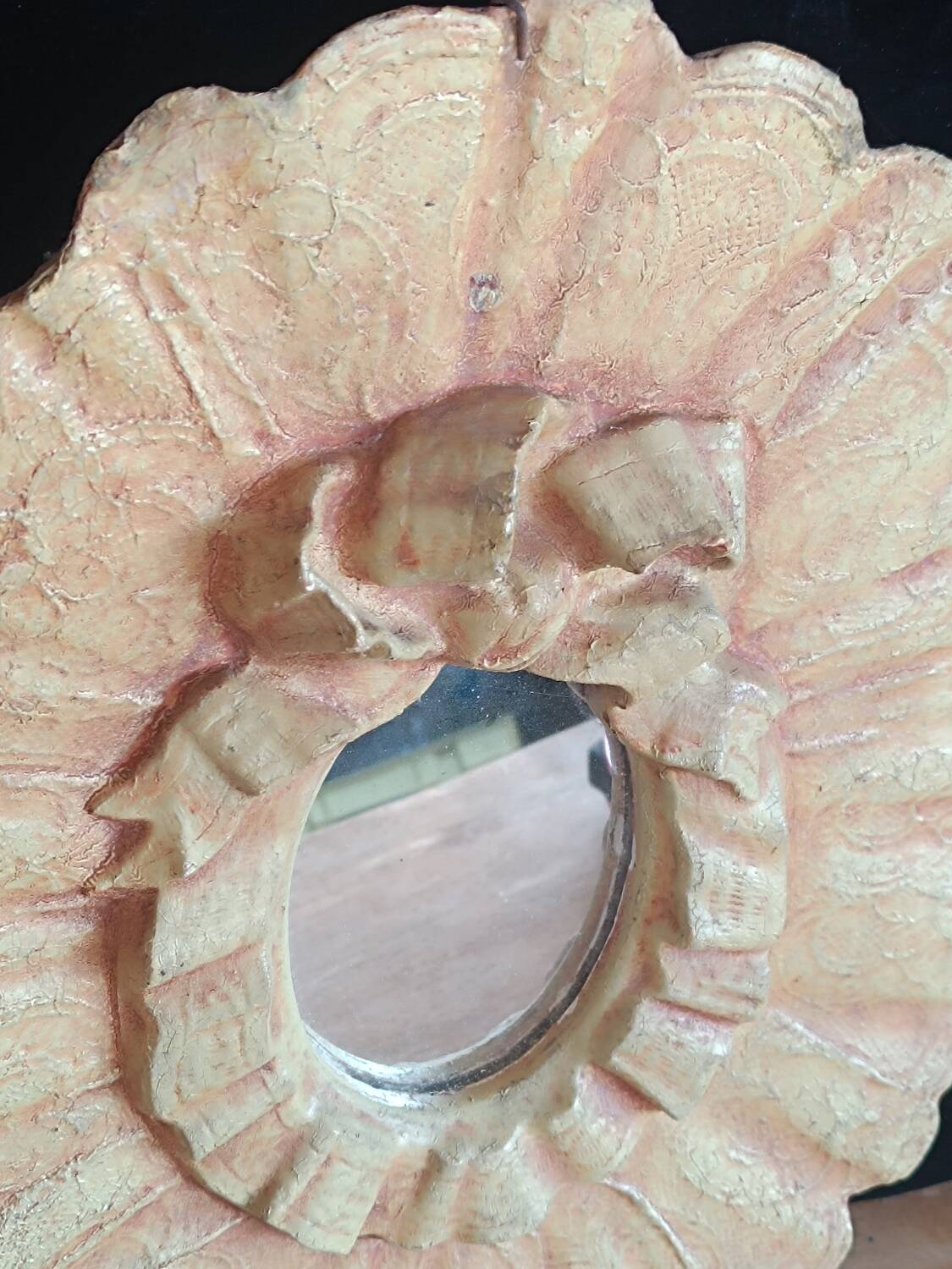 Painted oval plaster mirror