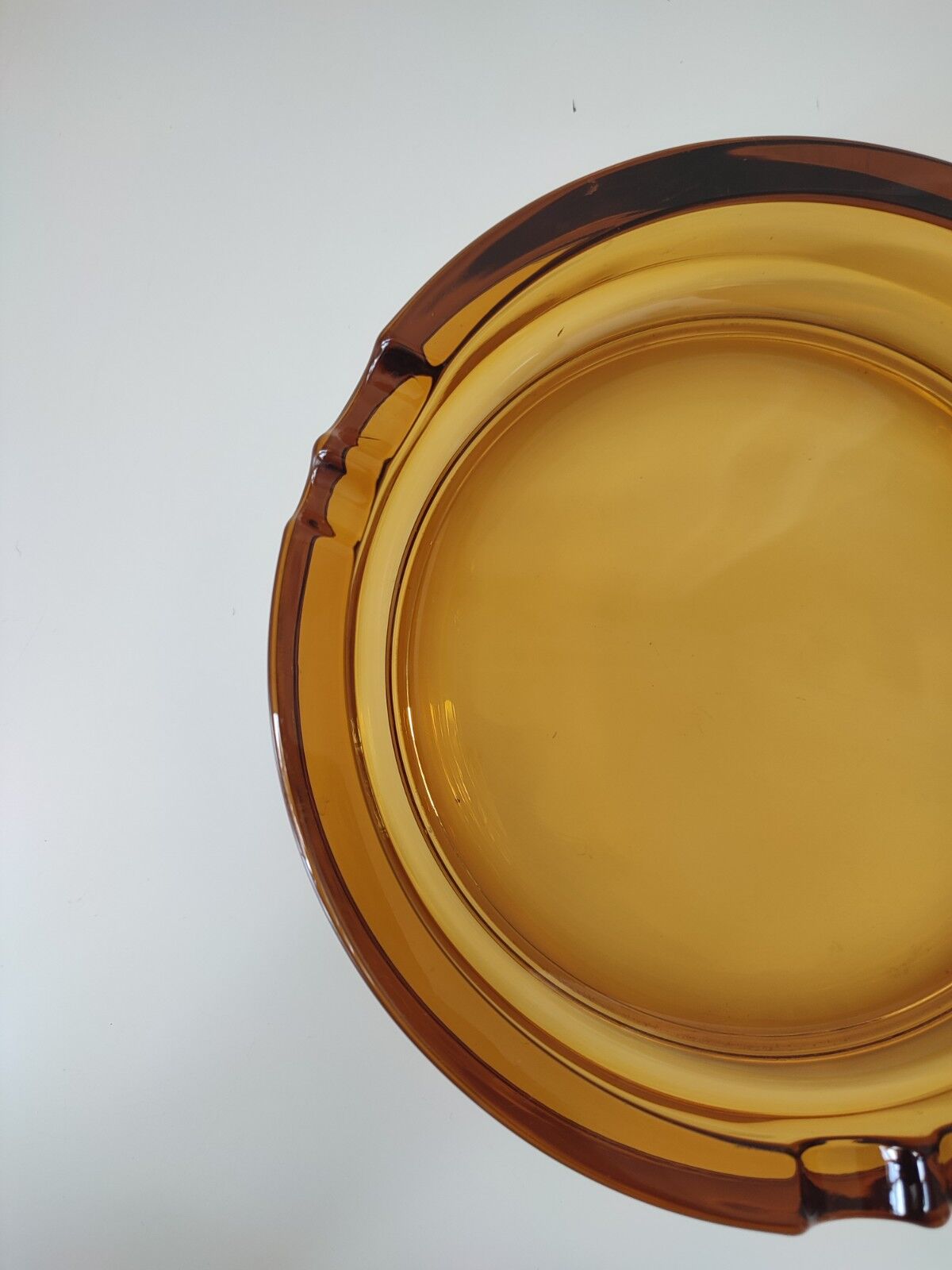 Amber glass ashtray