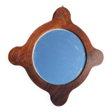 Wooden mirror with vintage rosettes
