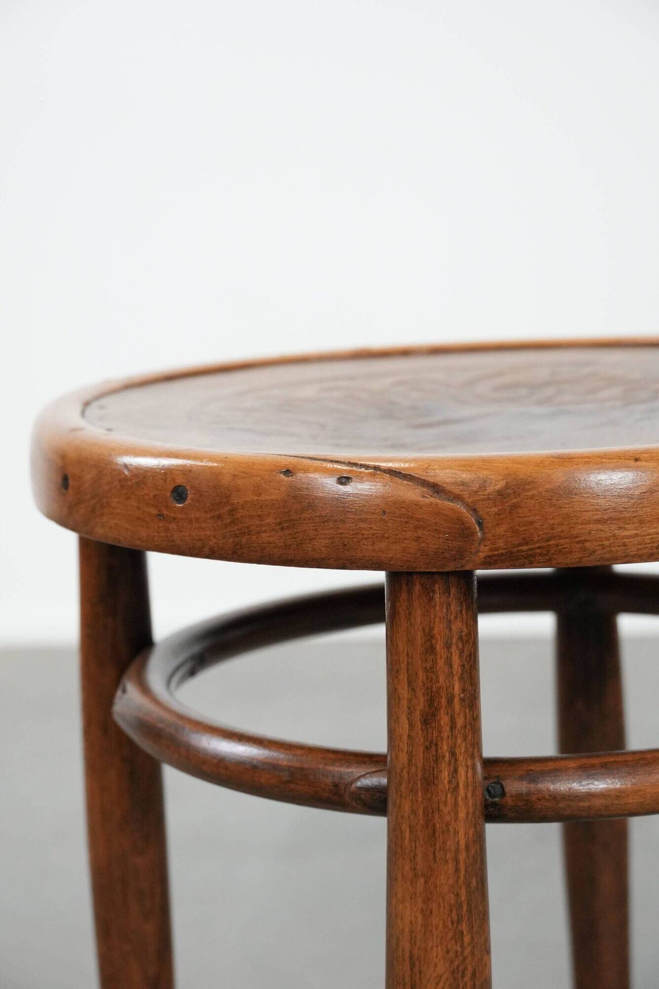 Antique bentwood stool from early 1900s with a seat with beautiful details