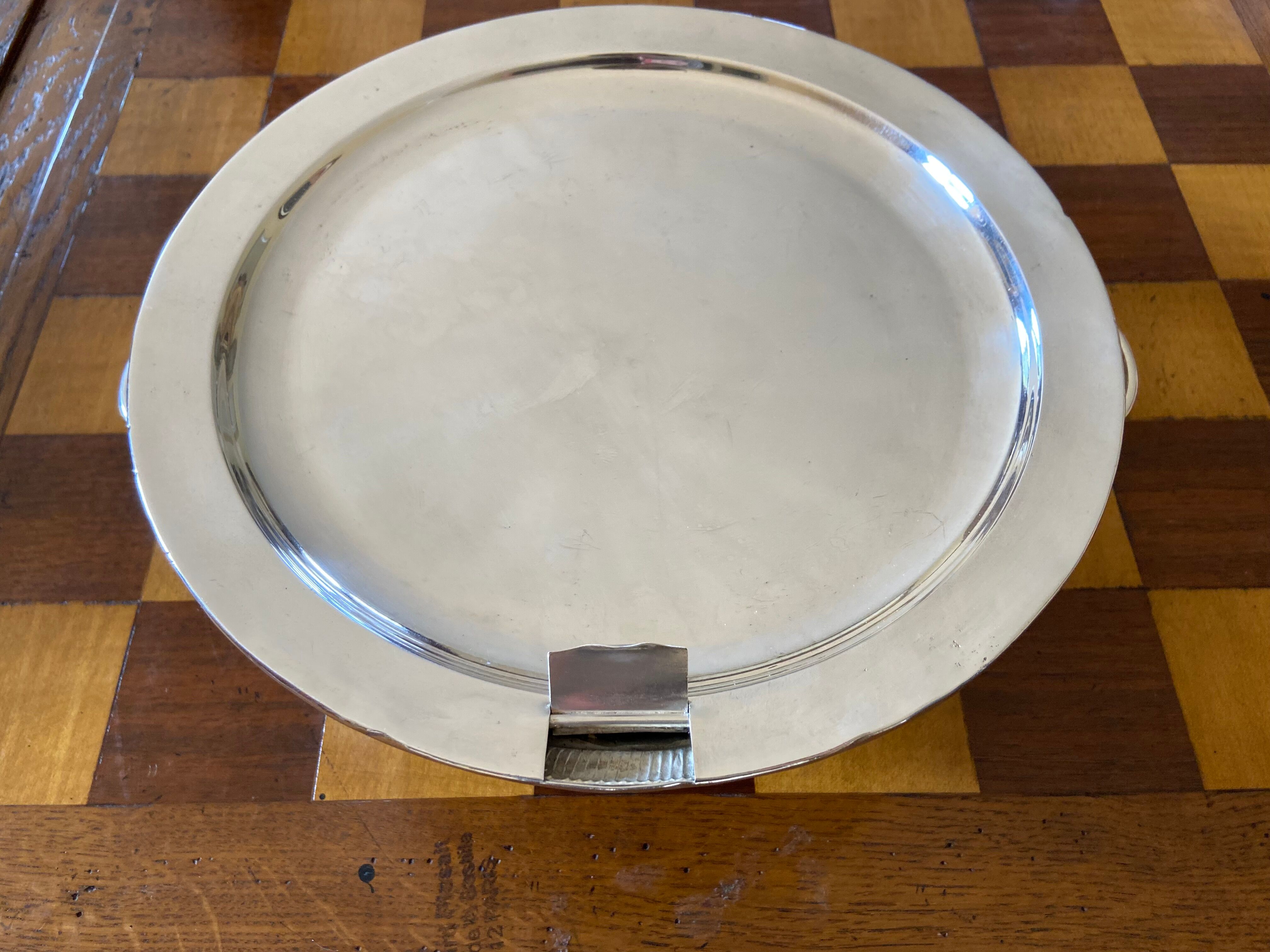 Old silver metal trivet