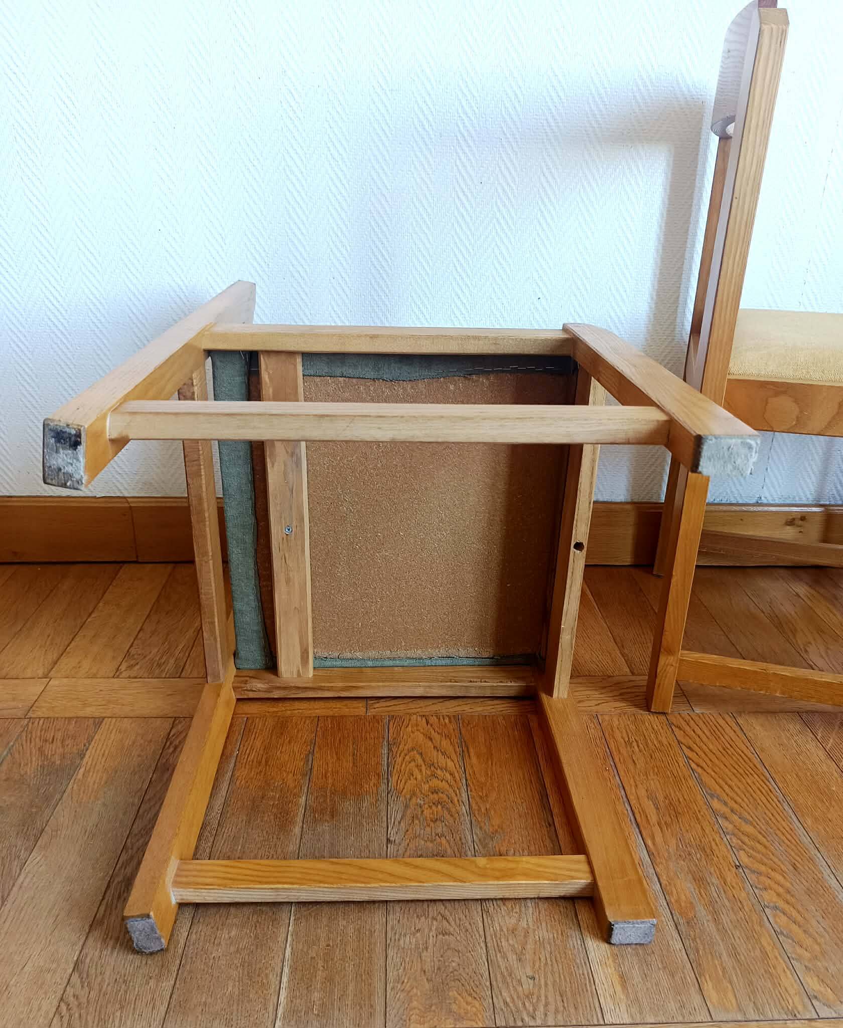 Six Scandinavian style chairs in elm and fabric.