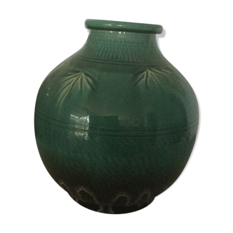 Green earthenware vase base with black flame decoration