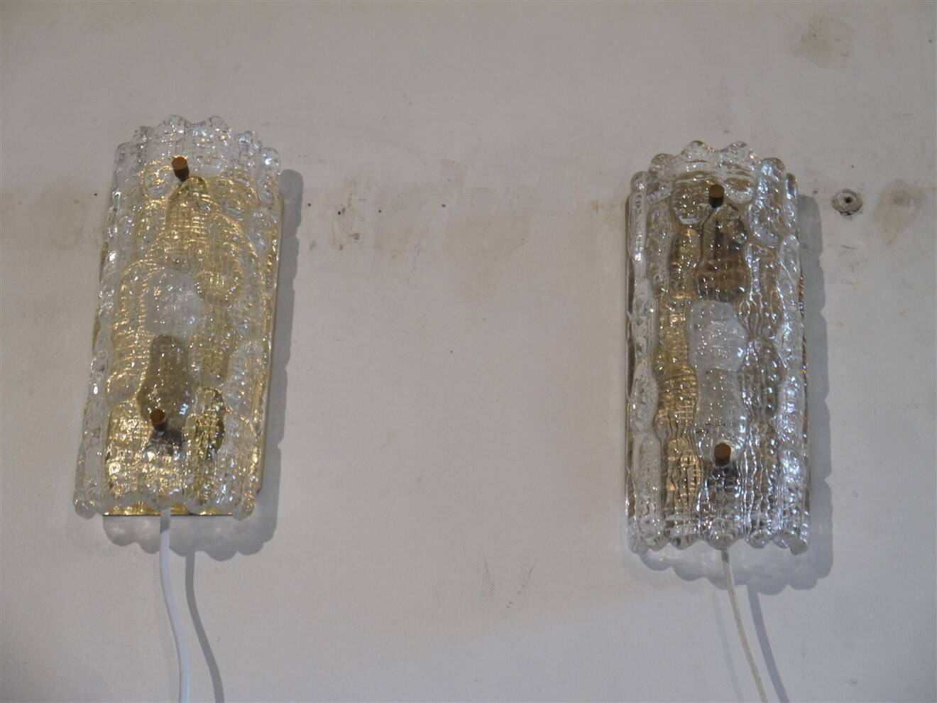 Pair of crystal and brass wall sconces by Carl Fagerlund