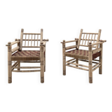 Pair of wooden armchairs and ropes