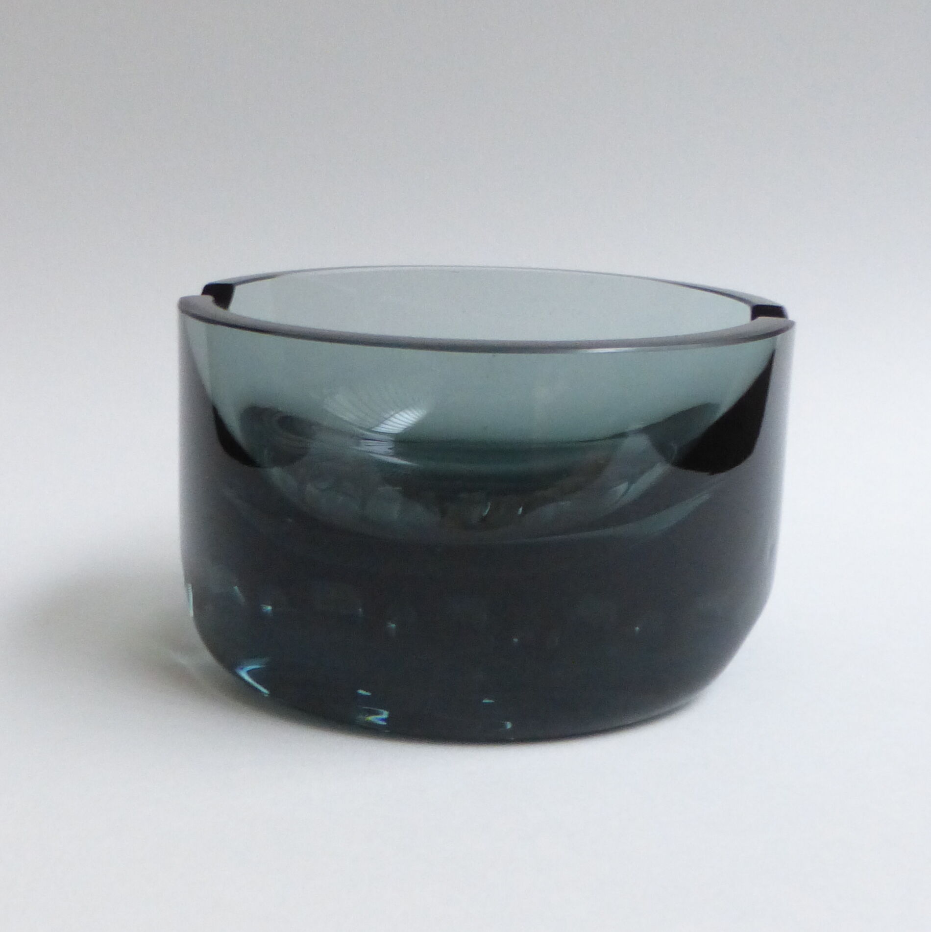Scandinavian ashtray in 1970's moulded smoked glass