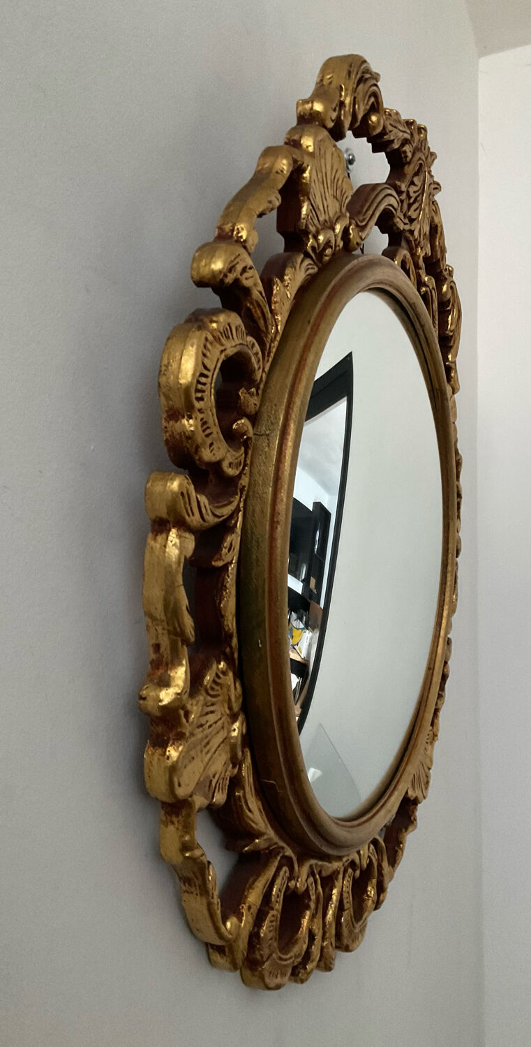 Ancient witch's eye mirror Dollanzo Italy in gilded wood