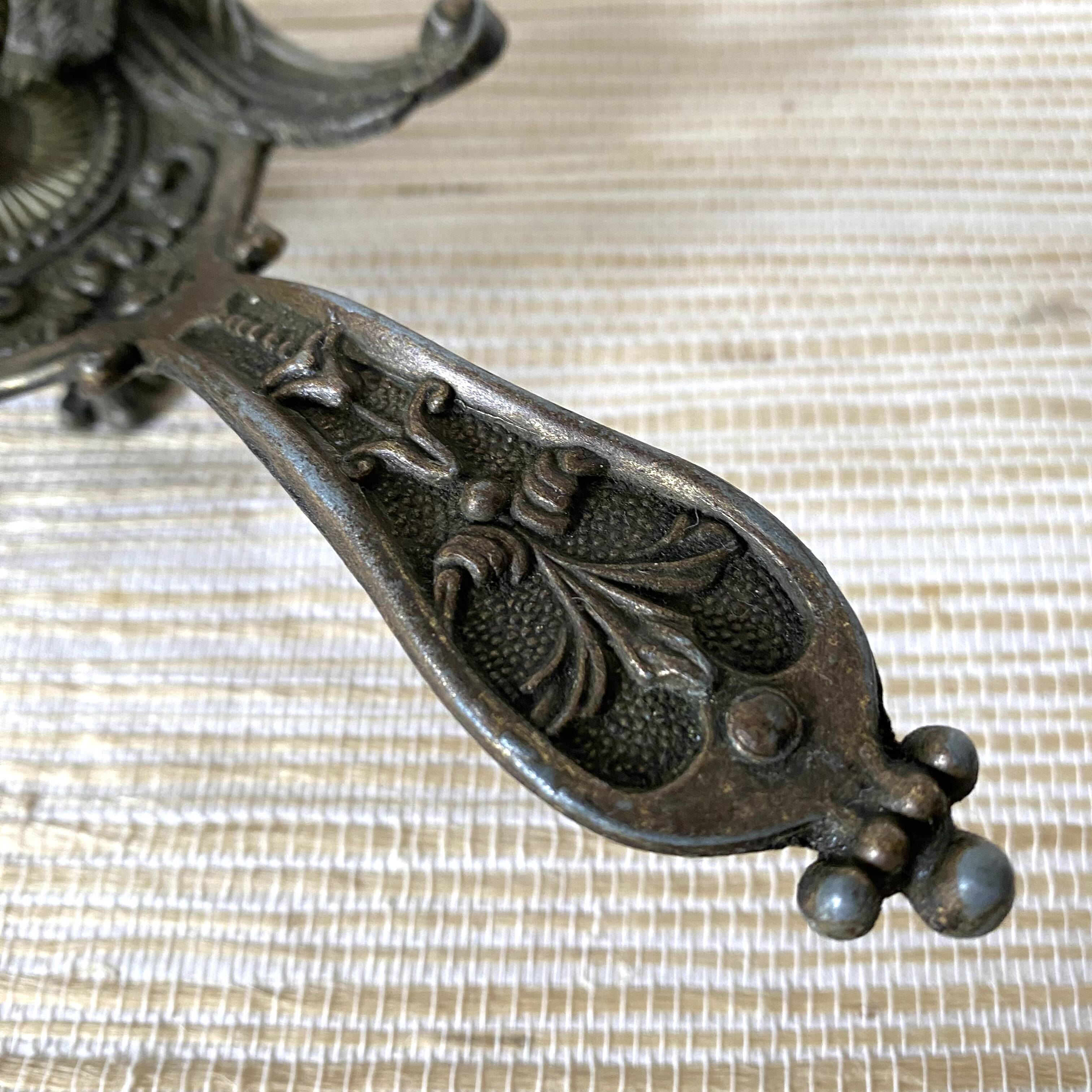 Brass bird candle holder
