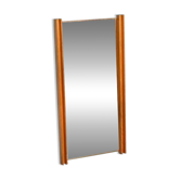 Minimalist Swedish mirror in 1970s Japandi pine wood.