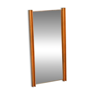 Minimalist Swedish mirror in 1970s Japandi pine wood.