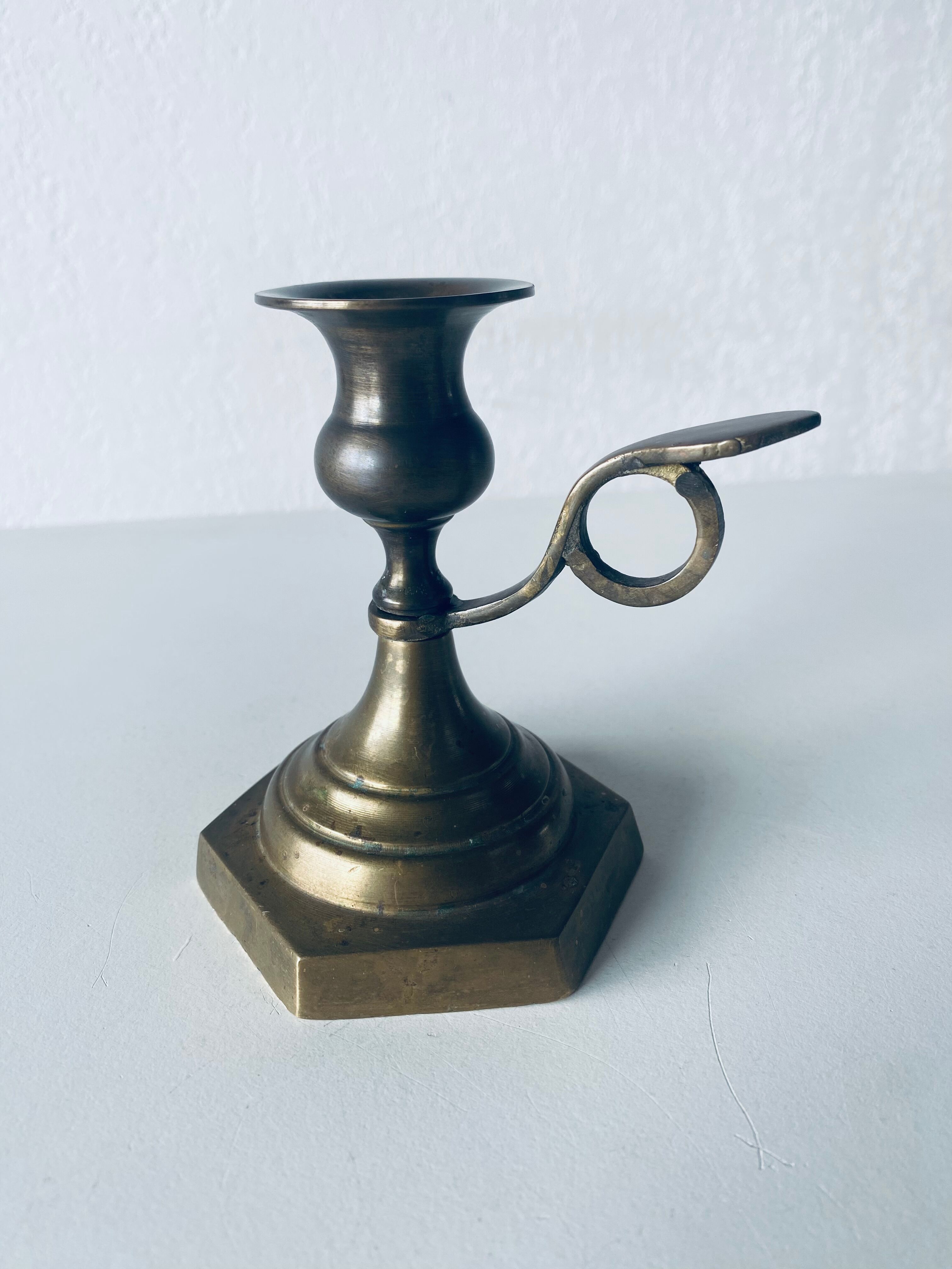 Candle holder with bronze handle