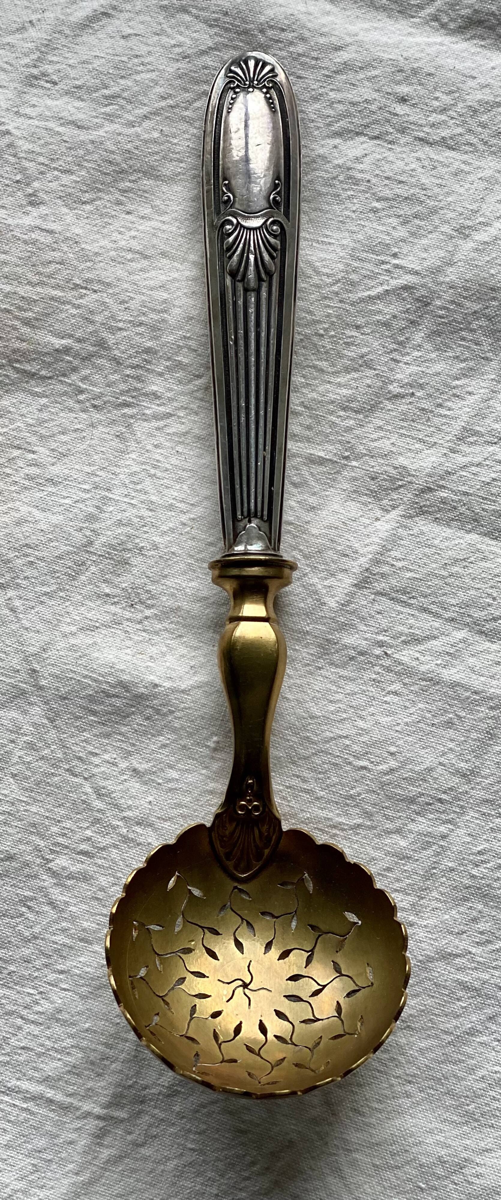 Silver sugar sifter spoon, 19th century.