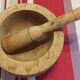 Mortar and wooden pestle