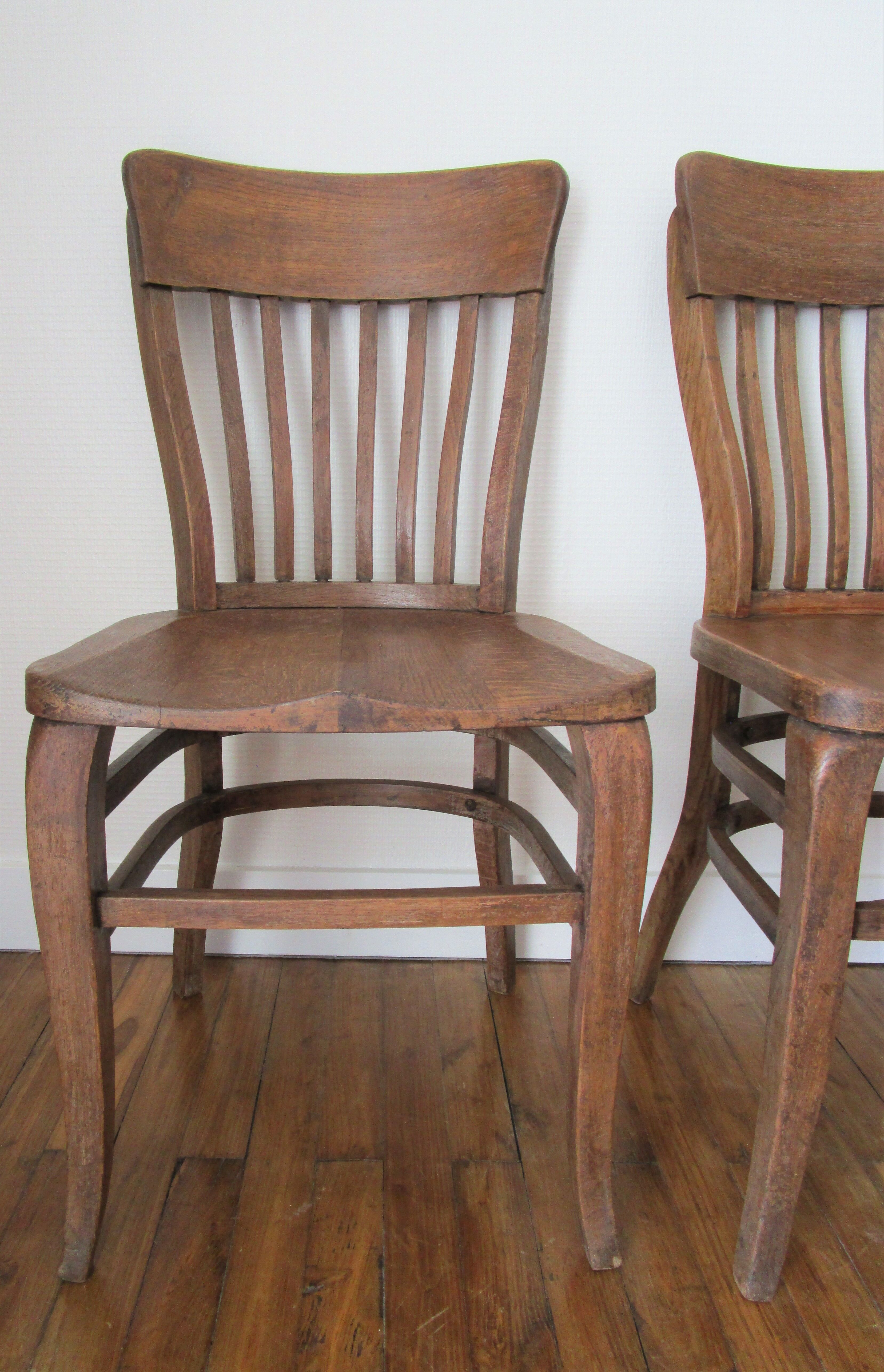 Two chairs solid oak patinated early twentieth century