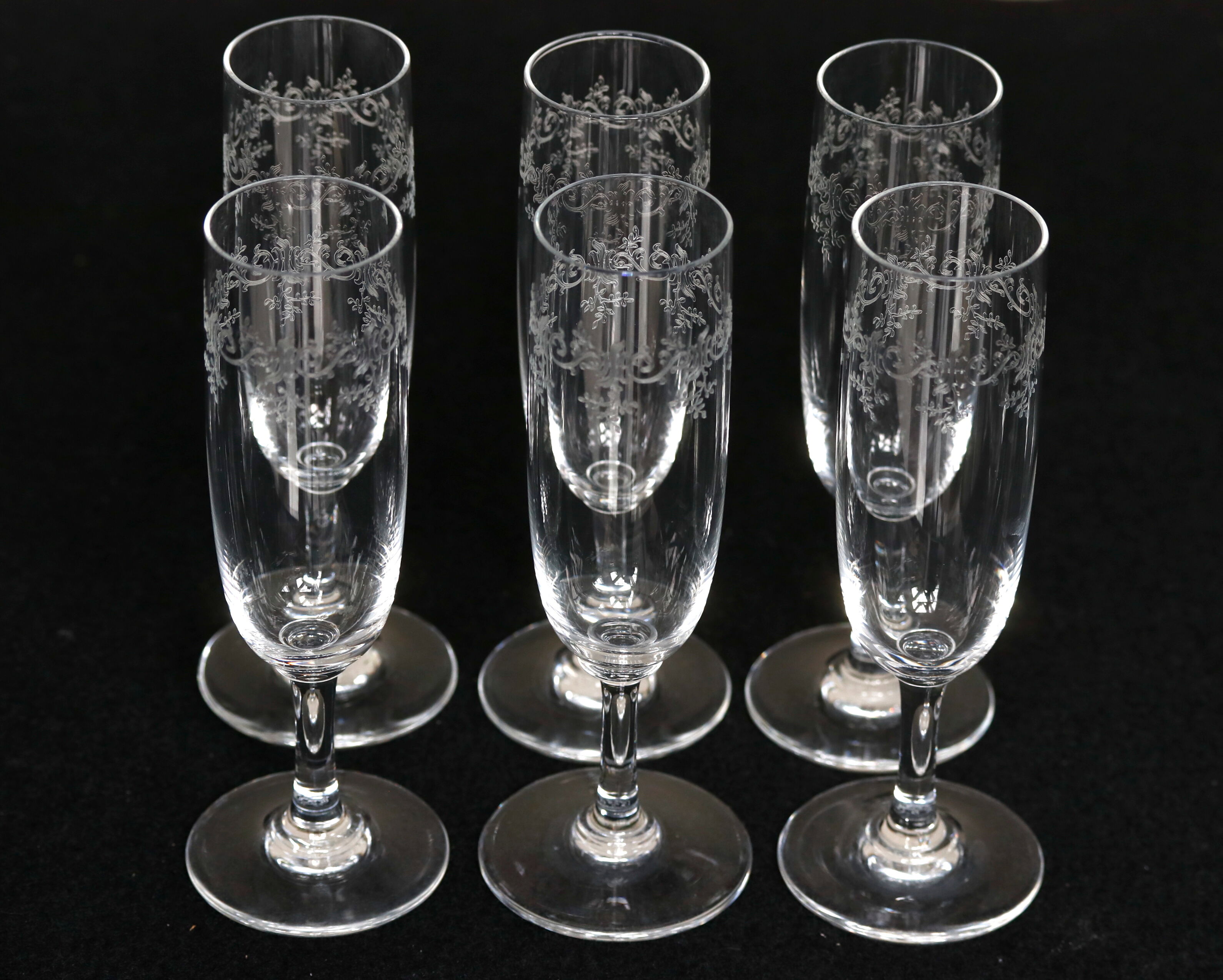 Suite of 6 Baccarat crystal flutes, model Sévigné, signed