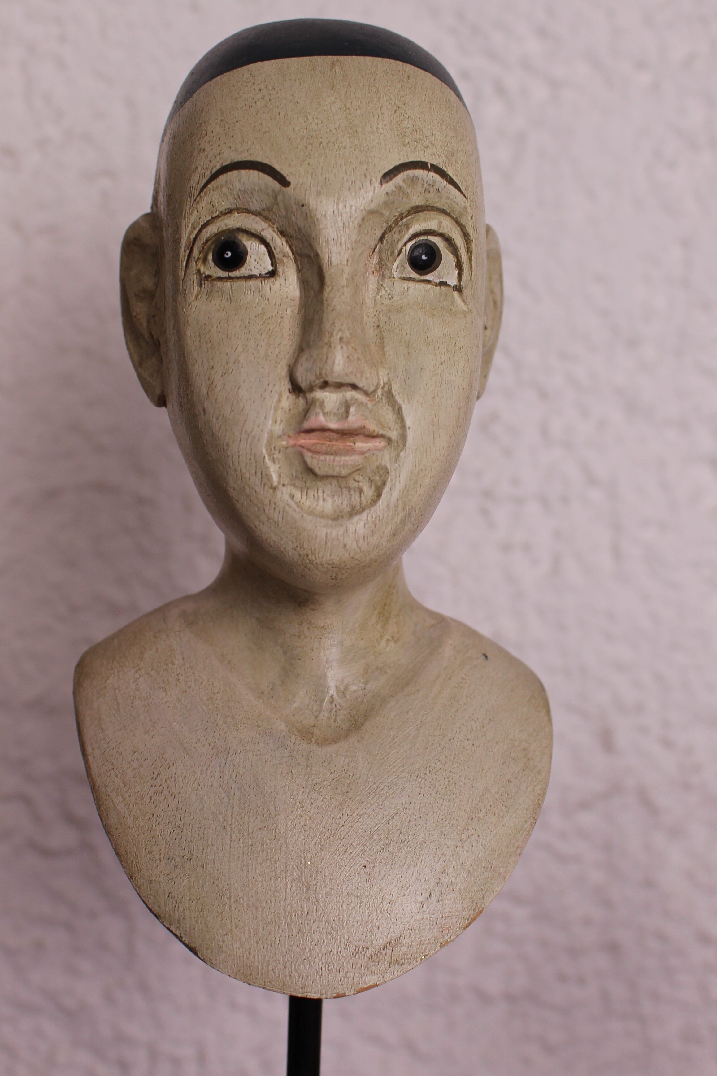 Trio of wooden busts