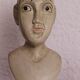 Trio of wooden busts