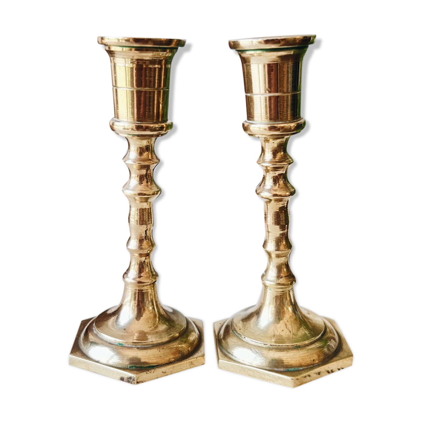 Duo of small brass candle holders