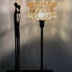 Table lamp with a golden glass lampshade, like a cup