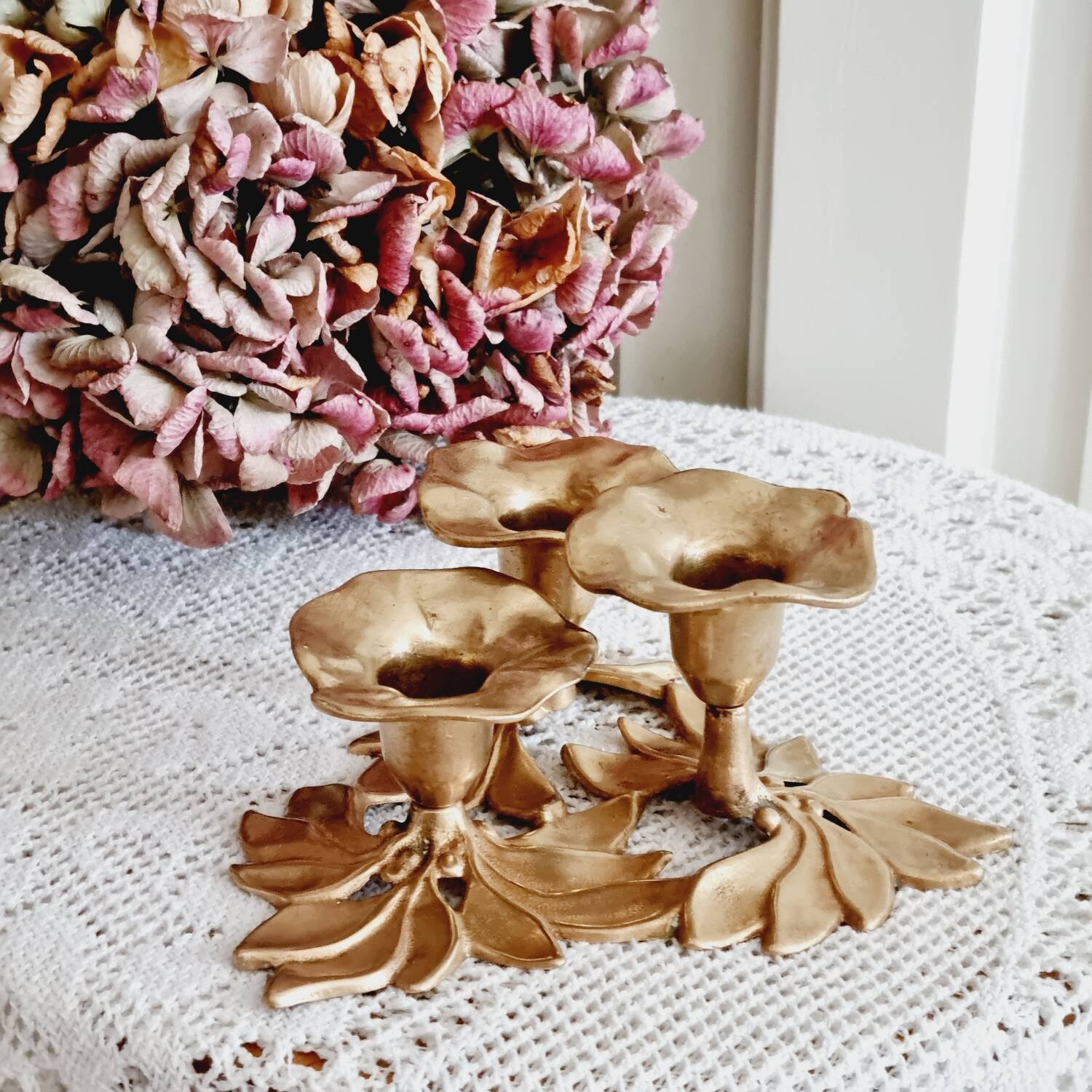 Low brass flower candle holder