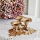 Low brass flower candle holder