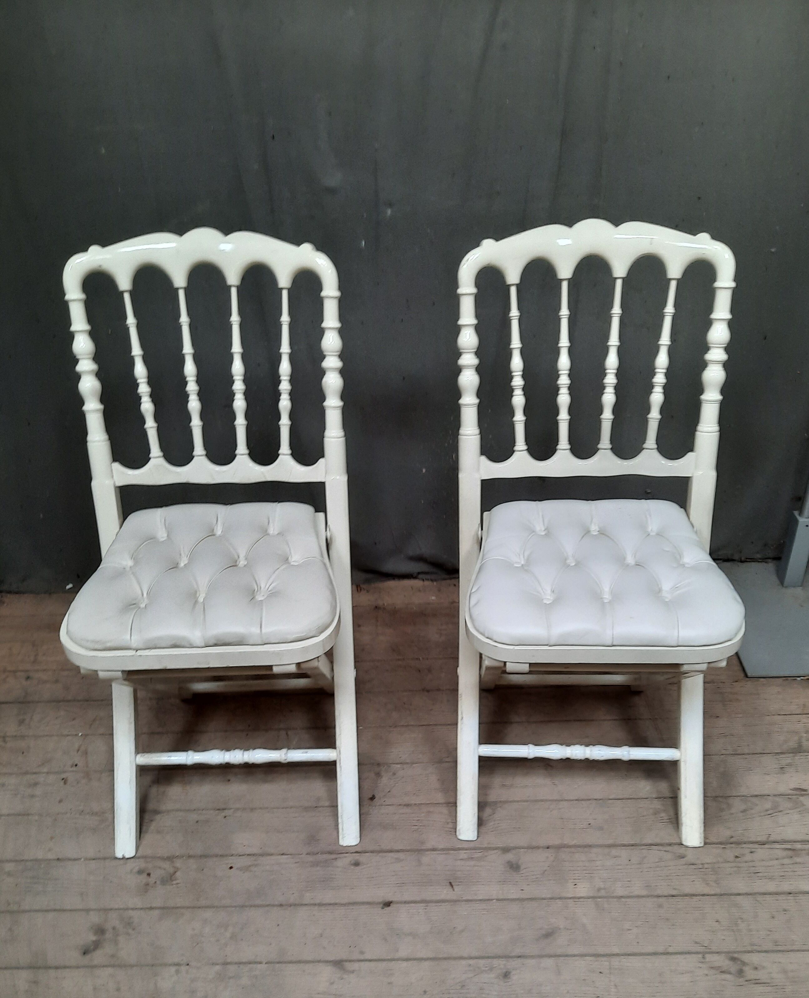 Pair of upholstered folding chairs