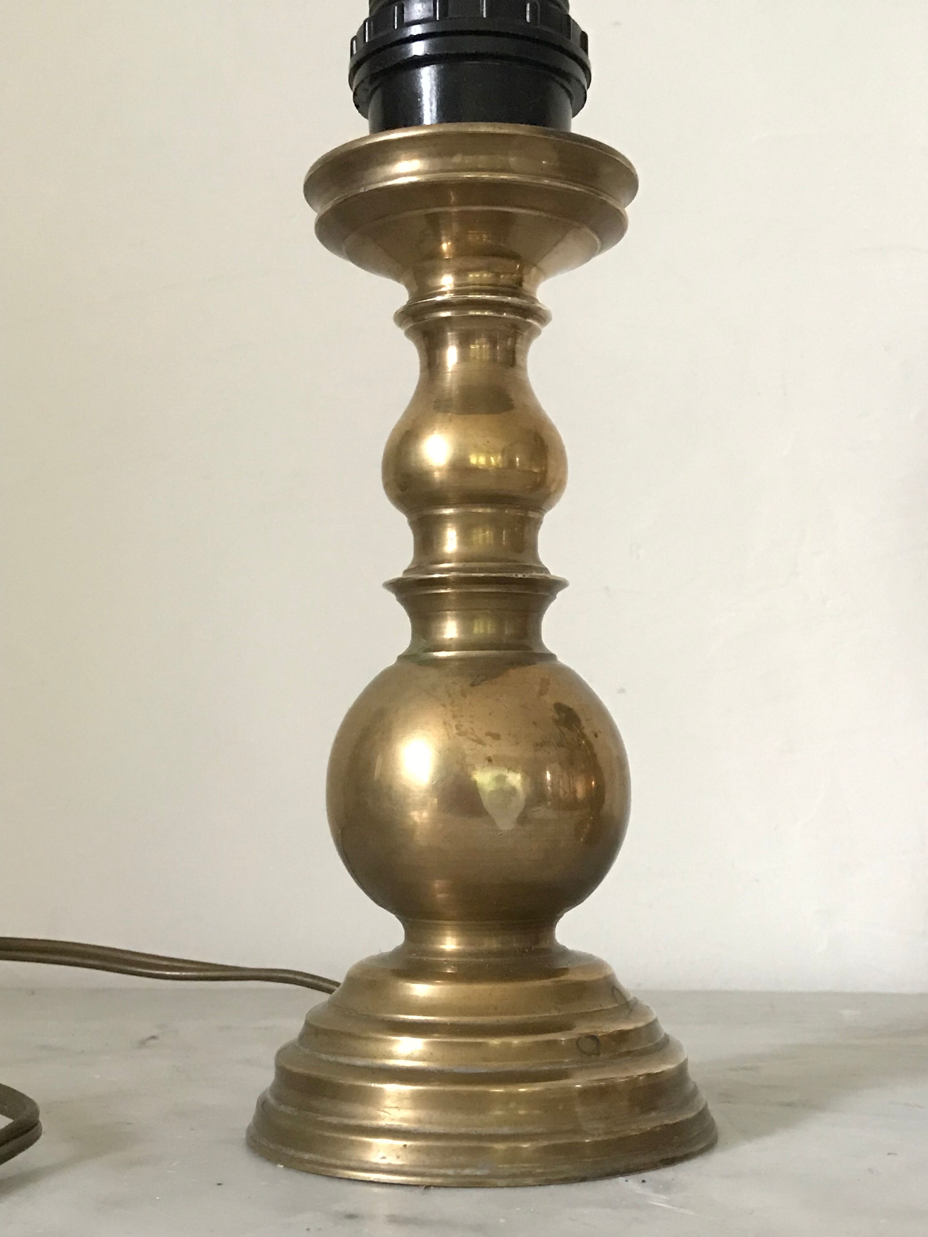 Pair of brass lamps