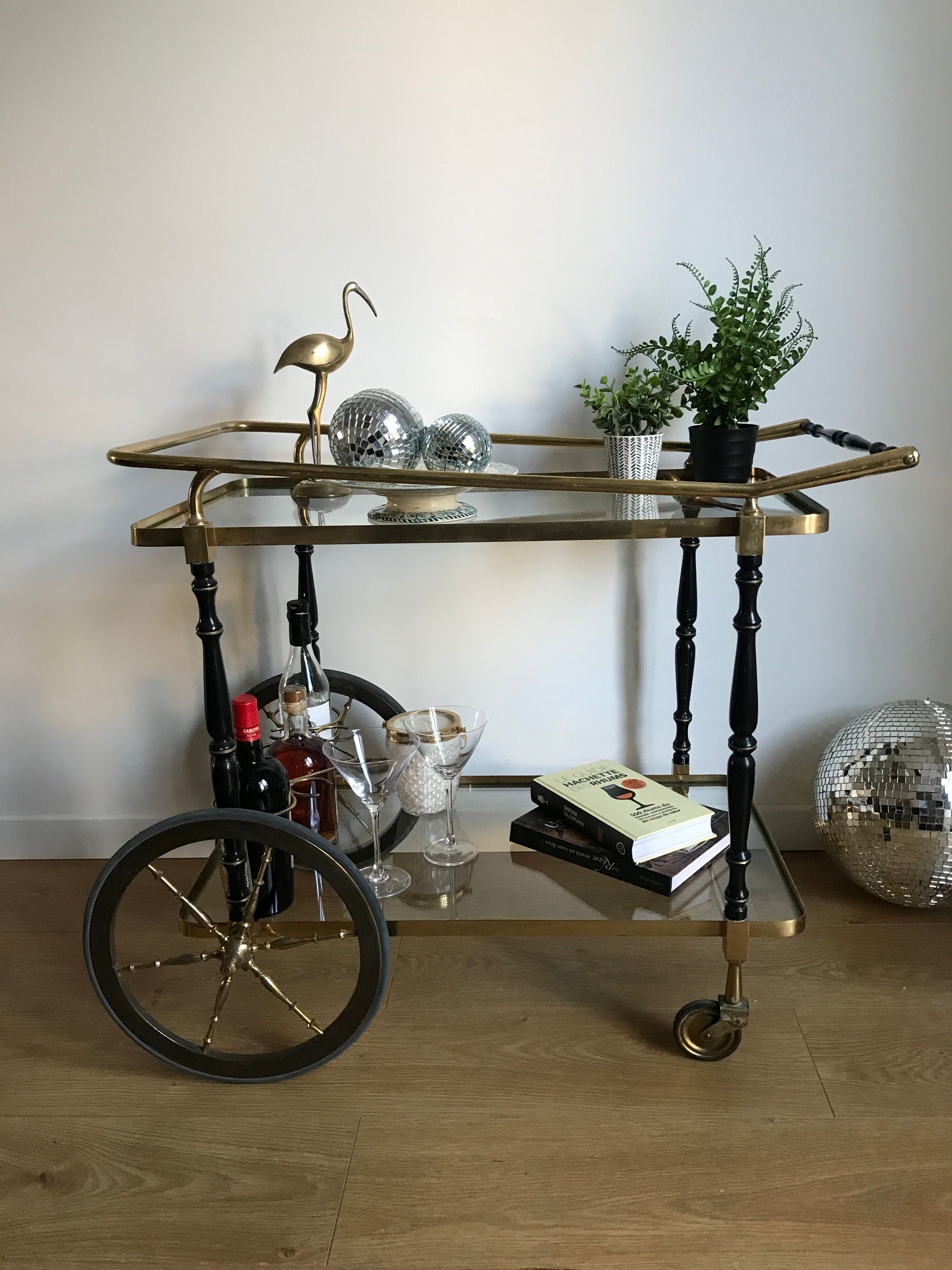 Vintage rolling golden and black dessert in brass and glass
