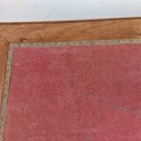Old wooden desk, red felt top