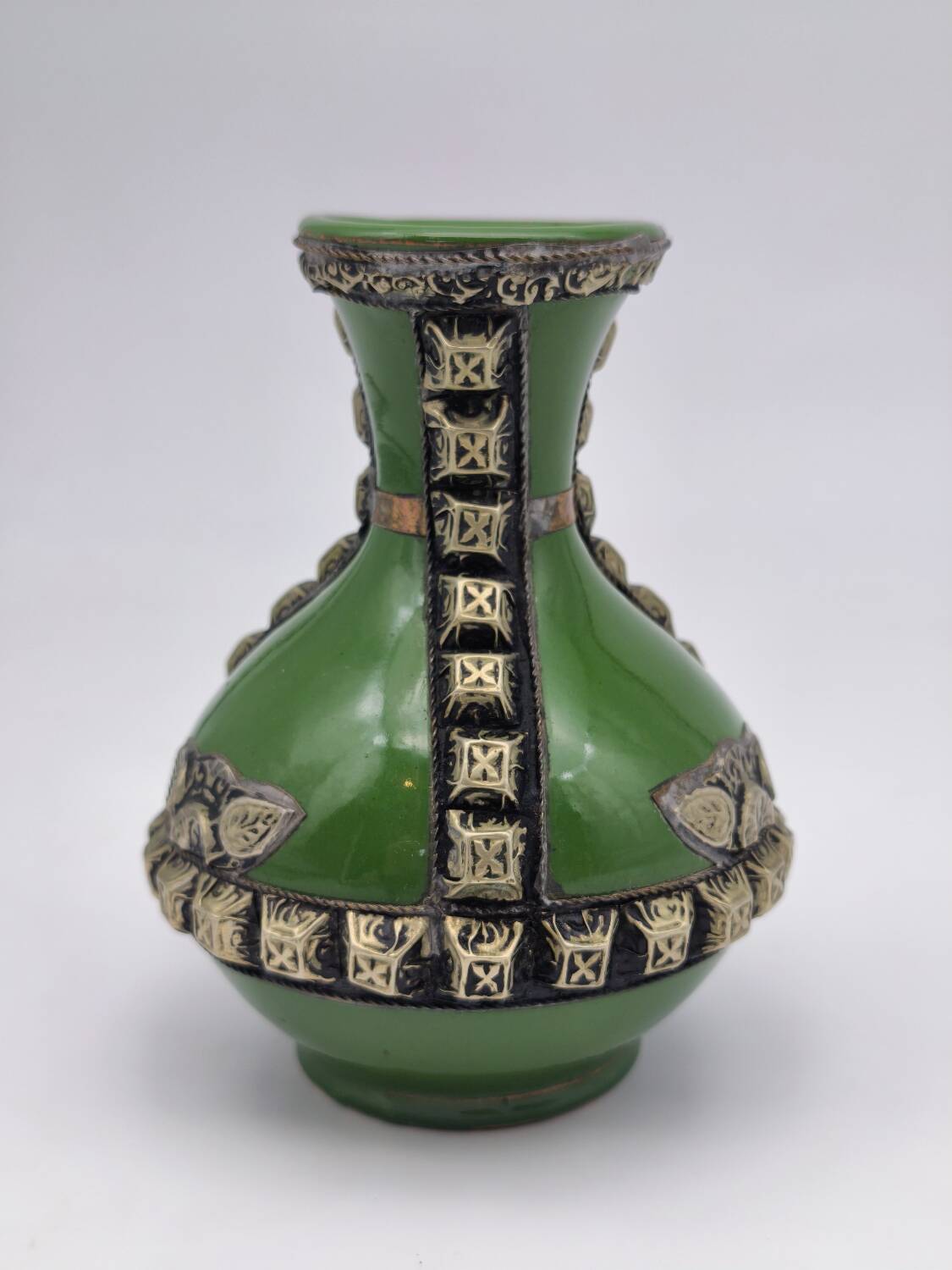 Antique green glazed ceramic vase with relief decoration – Europe