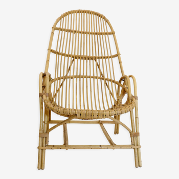 Rattan armchair with armrest from the 60s-70s.