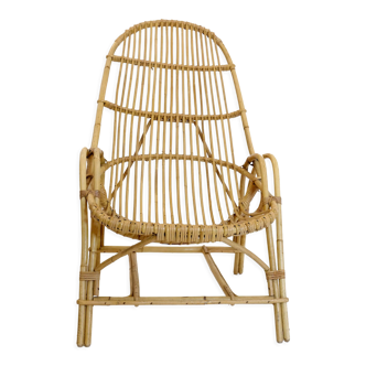 Fauteuil rotin avec accoudoir des années 60-70.