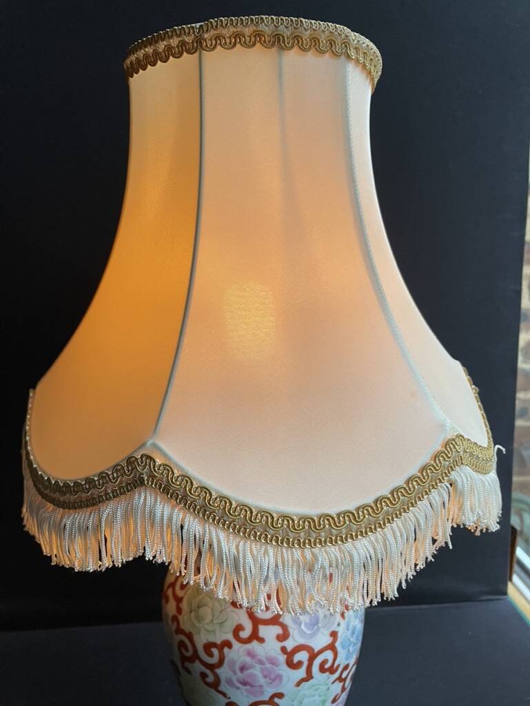 Old Asian vase mounted as a lamp with pagoda lampshade