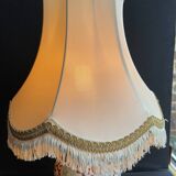 Old Asian vase mounted as a lamp with pagoda lampshade