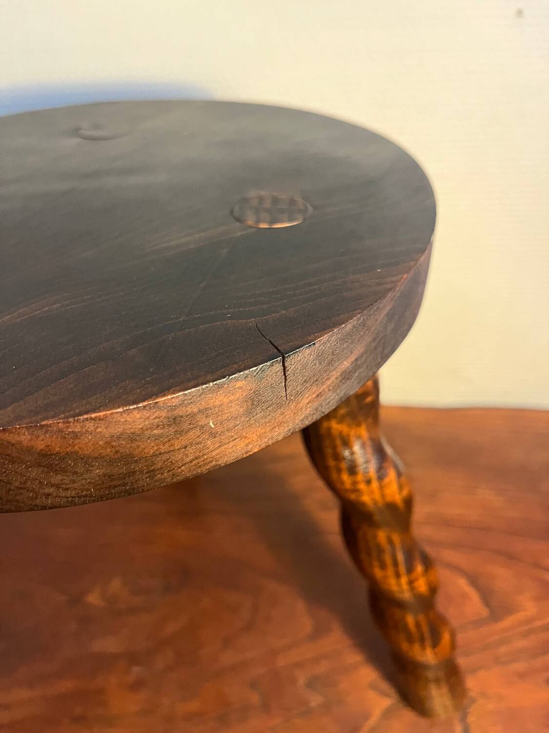 Round tripod stool with turned wooden legs