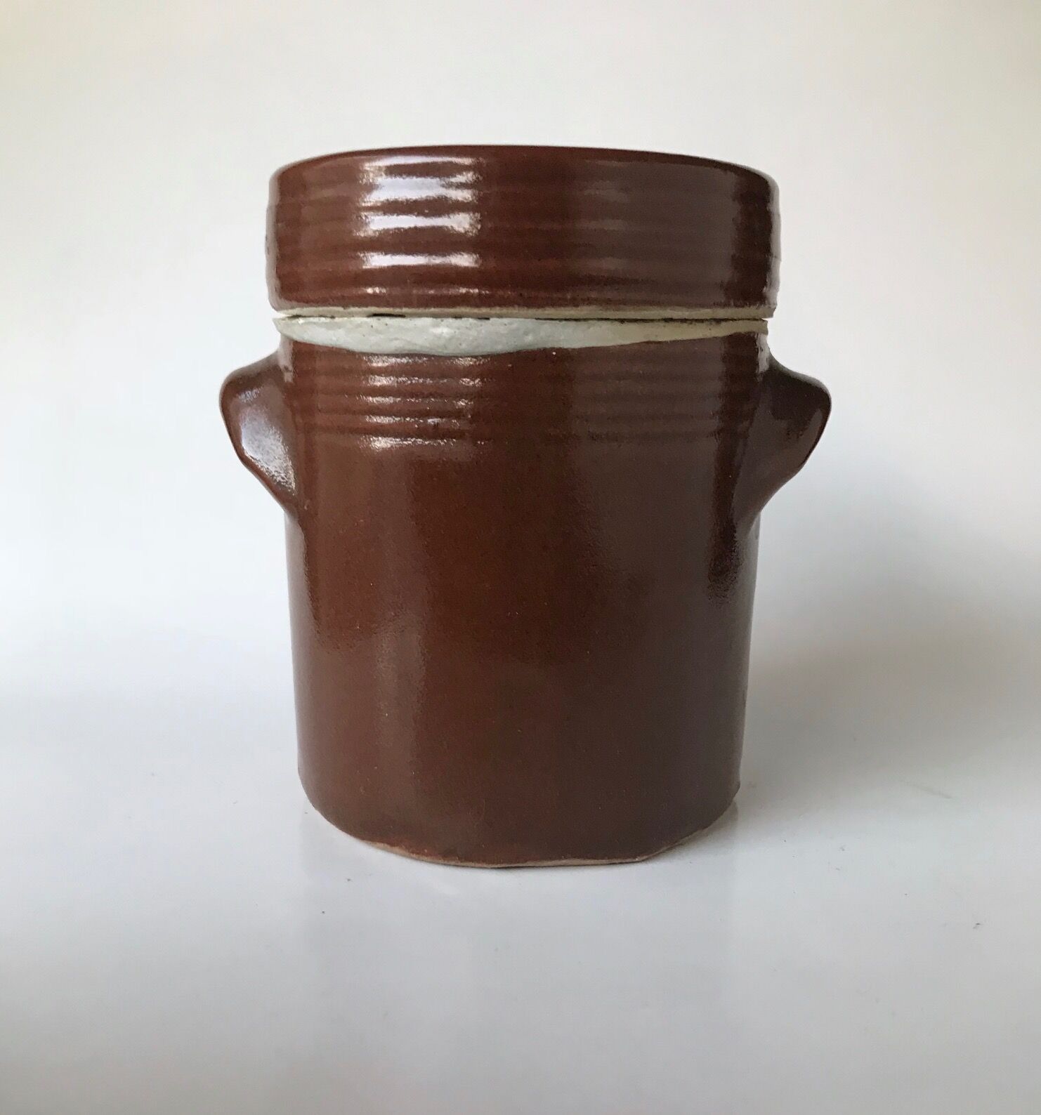 Small sandstone pot with lid