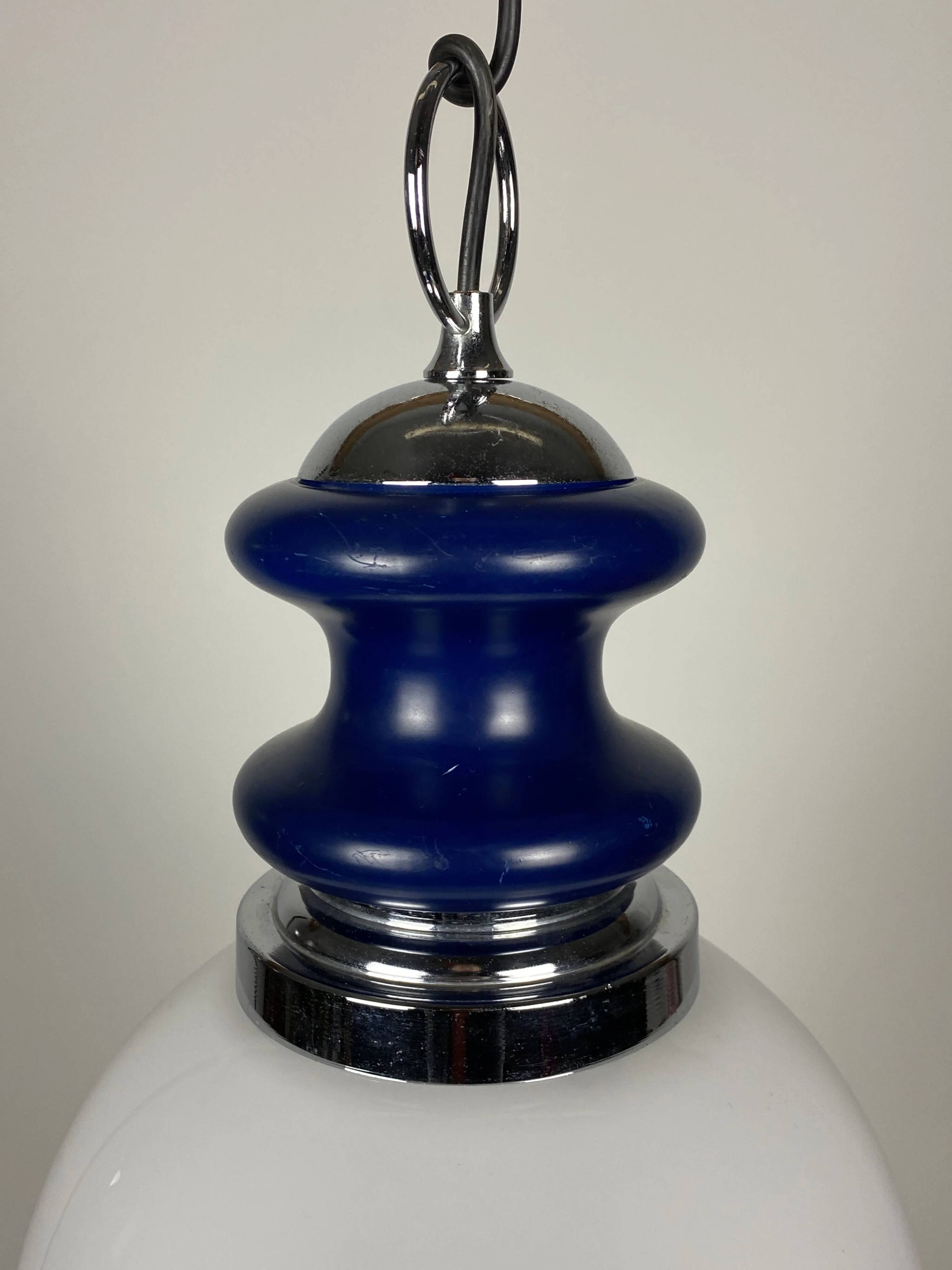 Vintage glass sphere with blue metal pendant from the 1970s.