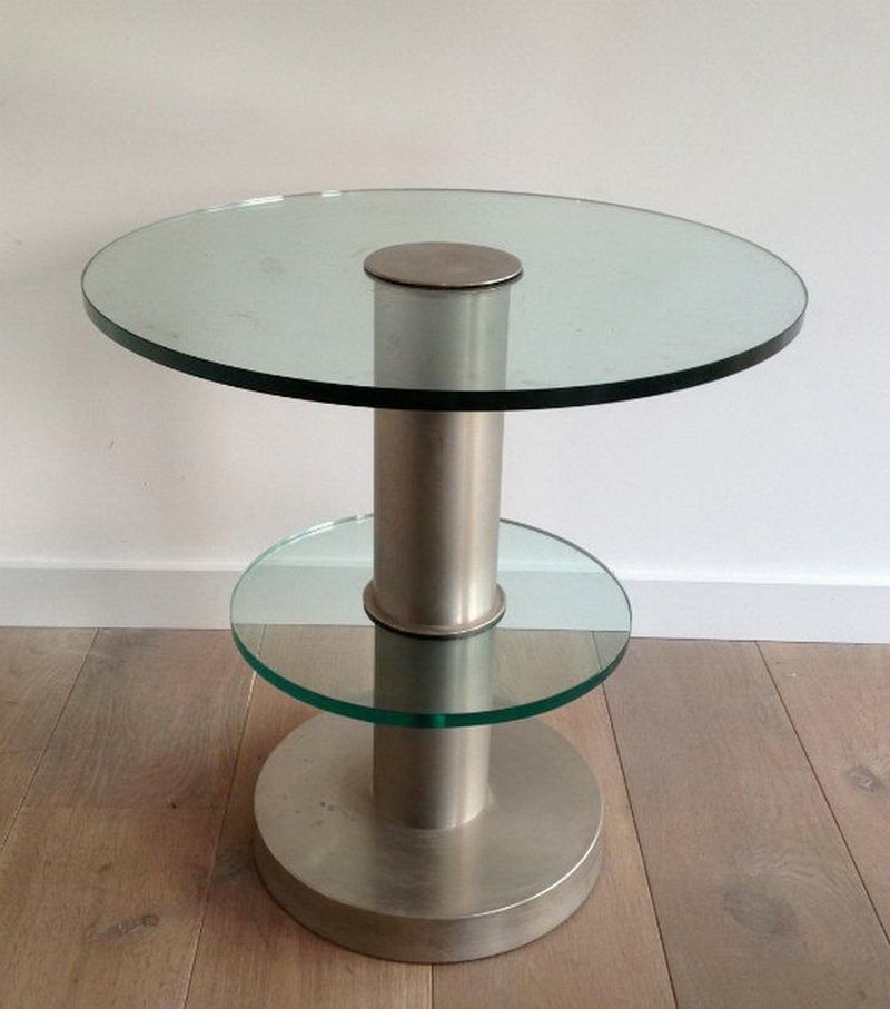 Brushed metal pedestal table and glass slabs