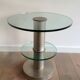 Brushed metal pedestal table and glass slabs